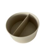 Round beige container with divider.